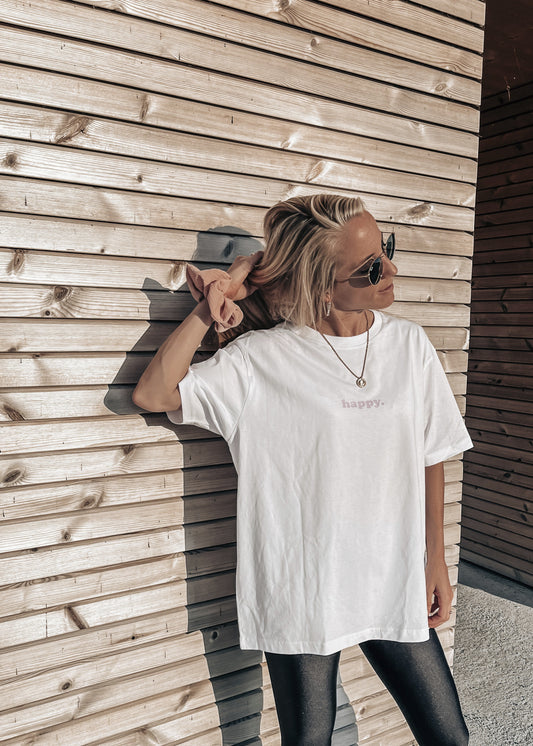 Unisex Relaxed T-Shirt “happy.” (Print ist Lila)